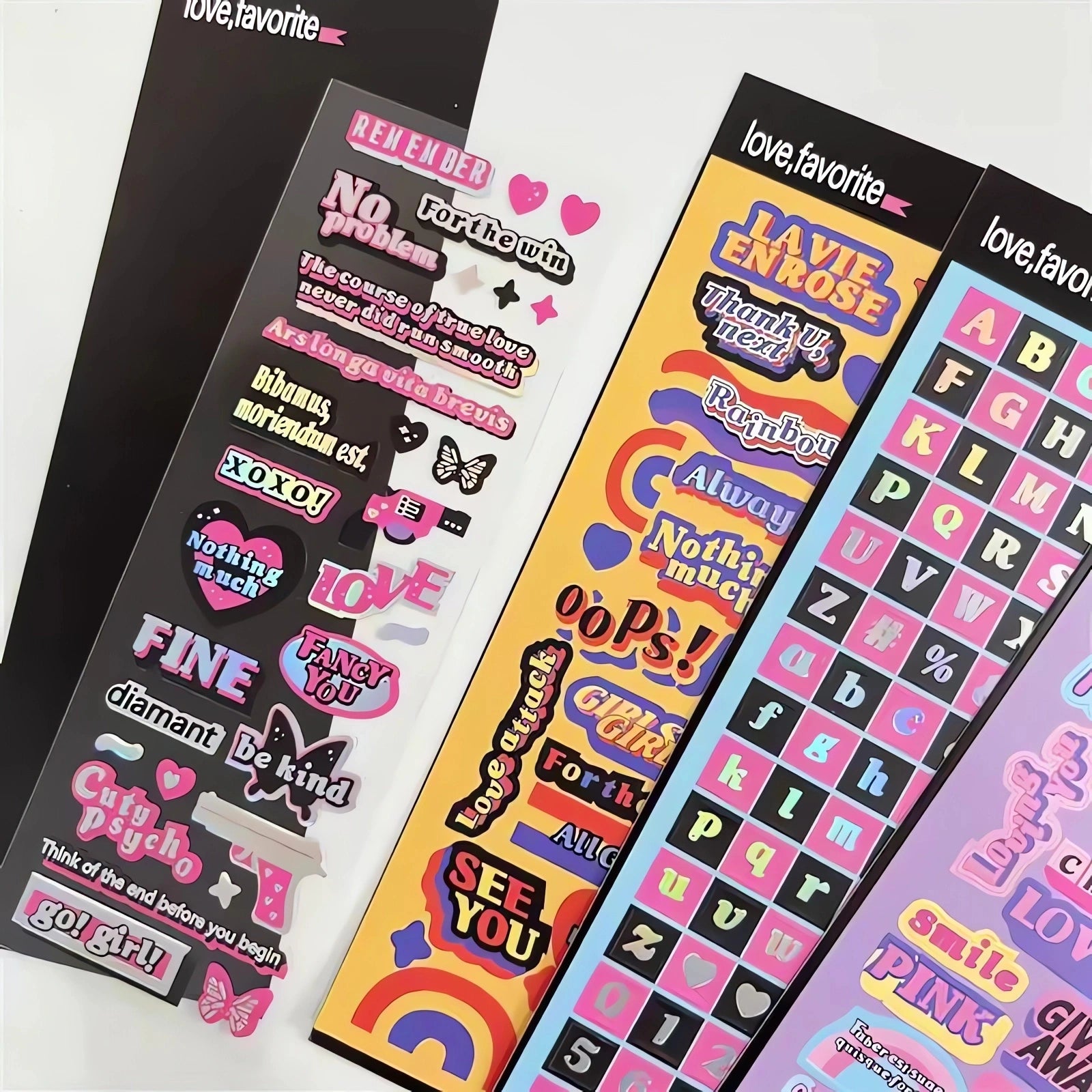 Close-Up of Pink & Purple Holographic Word Stickers – Shiny and Aesthetic Decoration for Journals & Planners