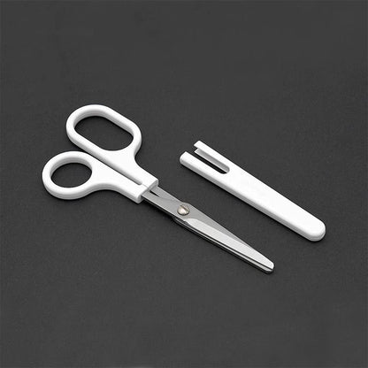 Removing Safety Cover from White Stainless Steel Craft Scissors for Safe Use